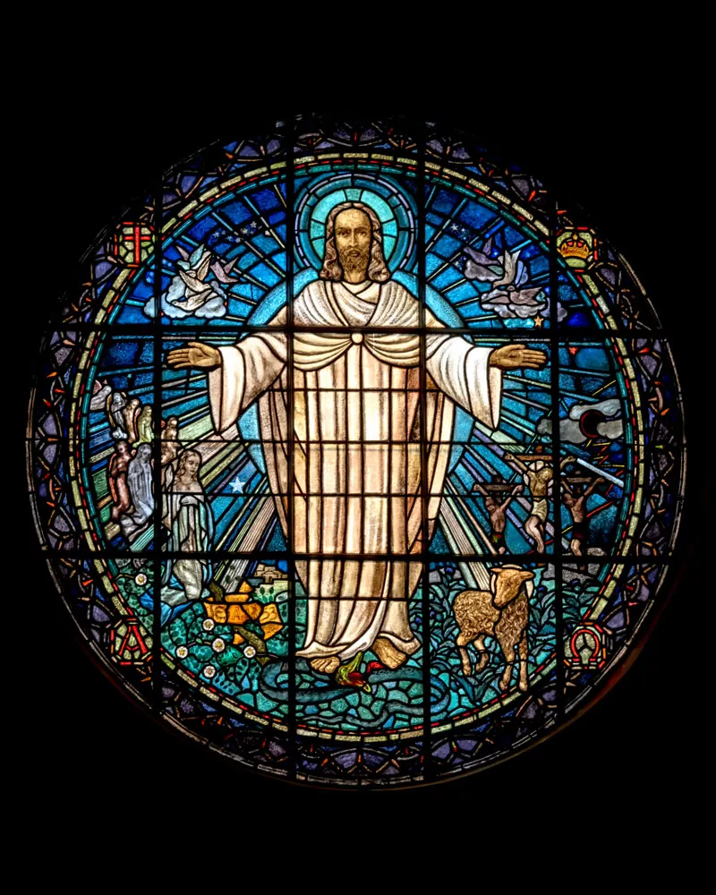 Stained glass windows in a church representing Jesus